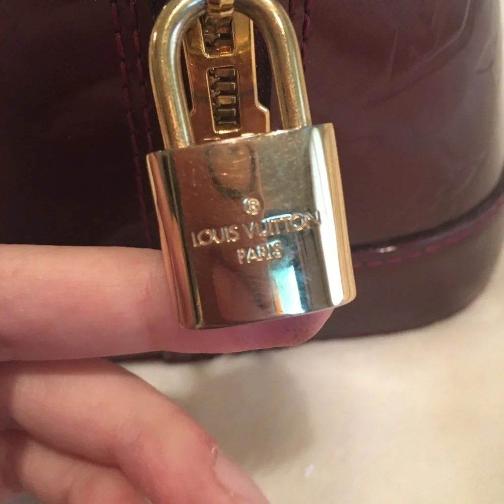 Louis Vuitton Alma pm rouge fauviste. Excellent